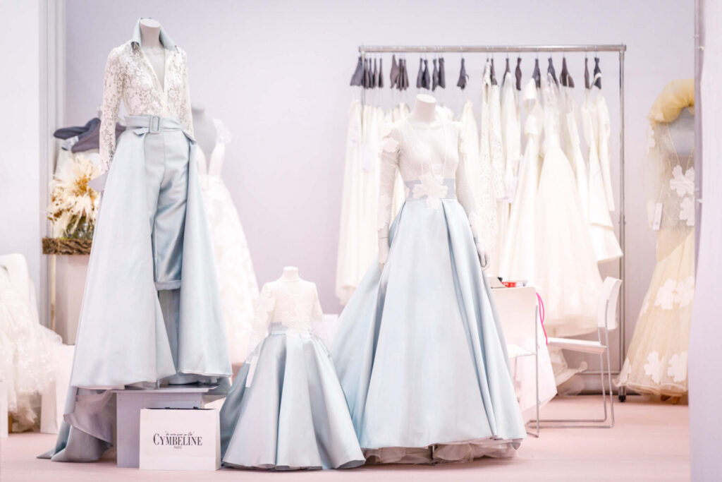 A collection of light blue wedding dresses and a jumpsuit at European Bridal Week. 